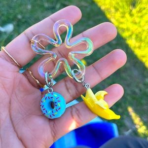 banana or donut solitaire earring